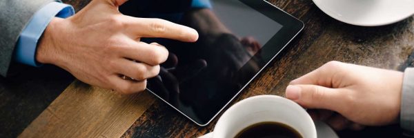 two-pairs-hands-gesture-meeting-coffee-wood-table two-pairs-hands-gesture-meeting-coffee-wood-table