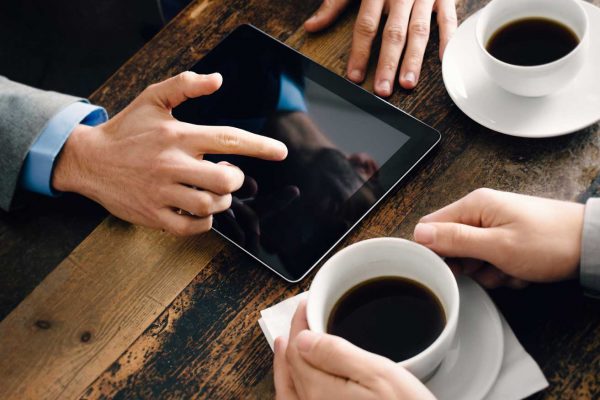 two-pairs-hands-gesture-meeting-coffee-wood-table Eclipse Proclaim Support